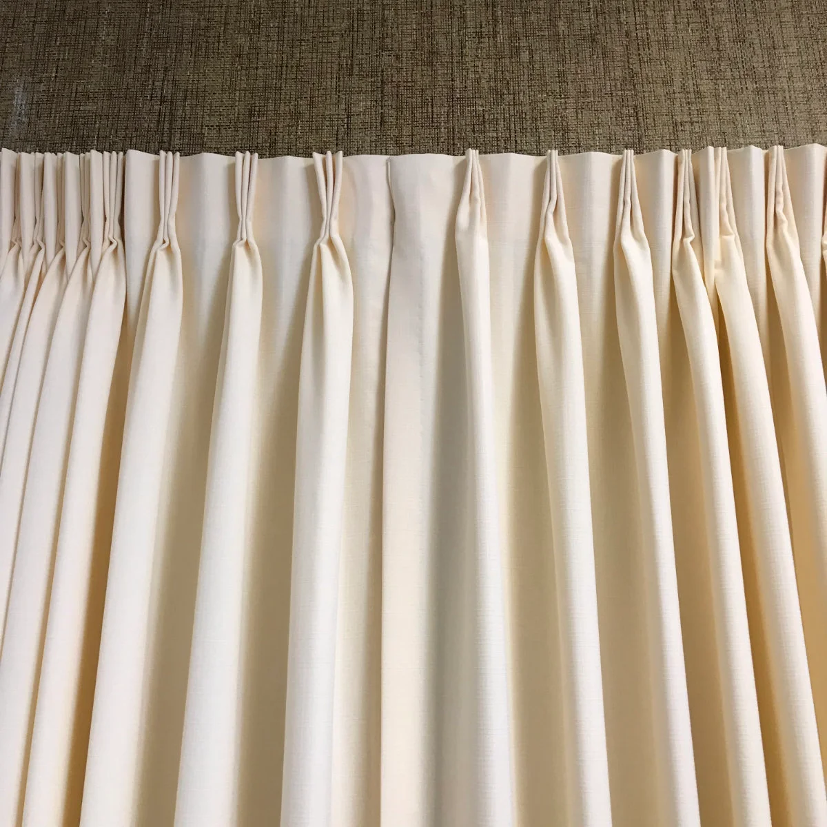 Custom drapery panels framing a large window